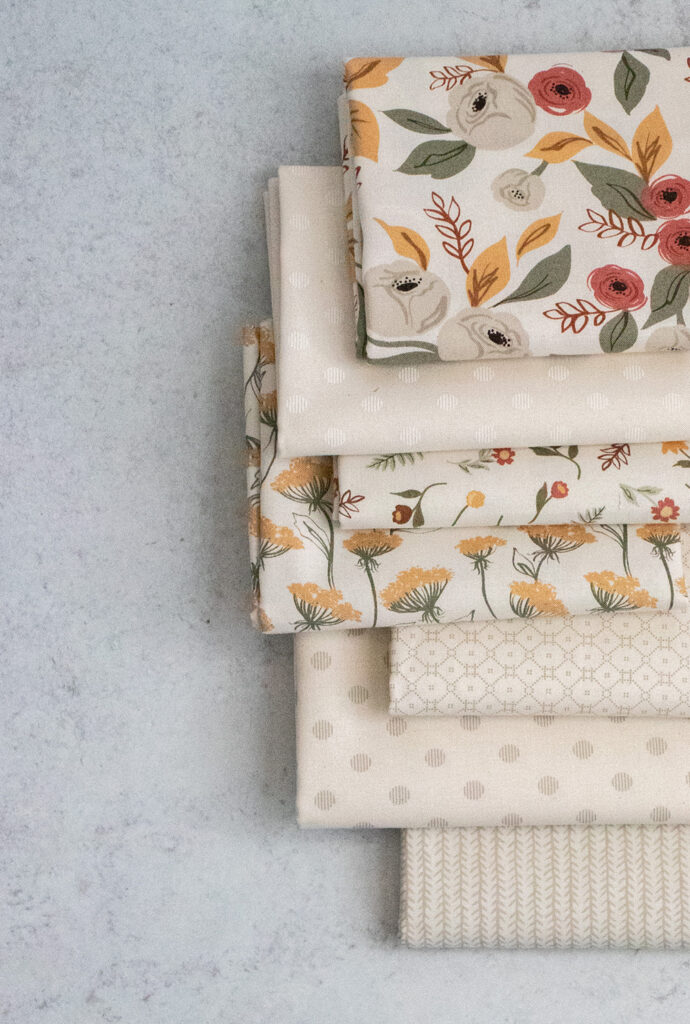 The ivory colorway of Matching solids of Flower Pot fabric by Lella Boutique for Moda Fabrics.
