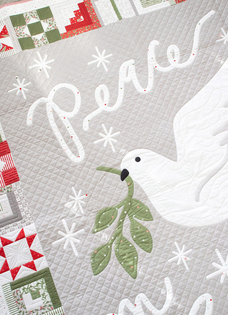 Peace on Earth quilt panel by Lella Boutique. This whole-cloth cotton Christmas quilt panel is part of the Christmas Morning fabric collection.