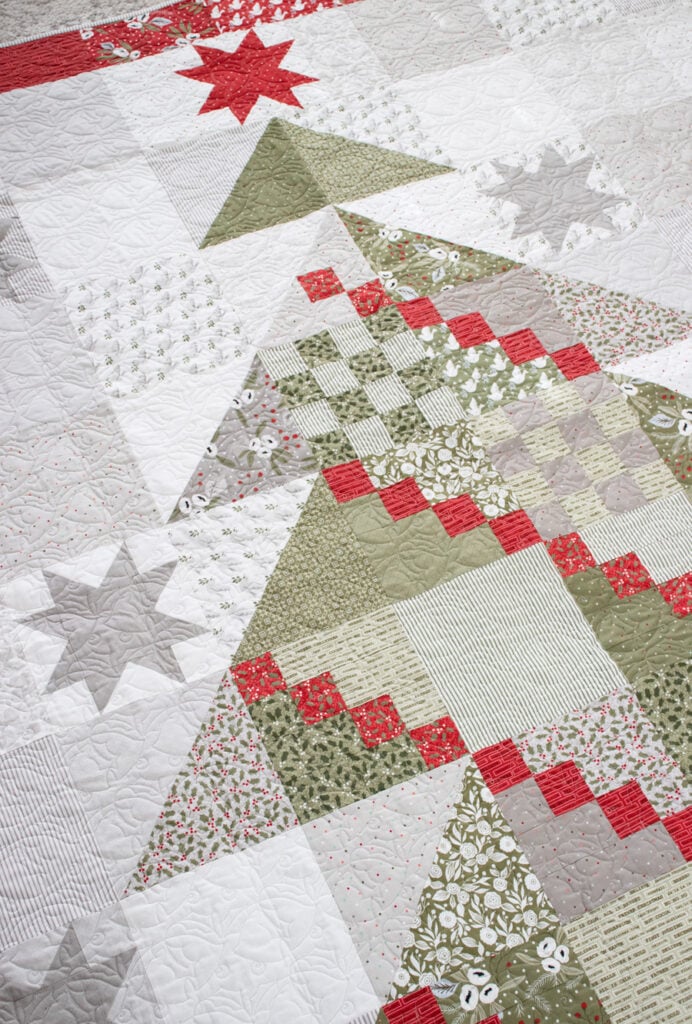 Yule Tree scrappy tree quilt by Lella Boutique. Fabric is Christmas Morning by Lella Boutique for Moda