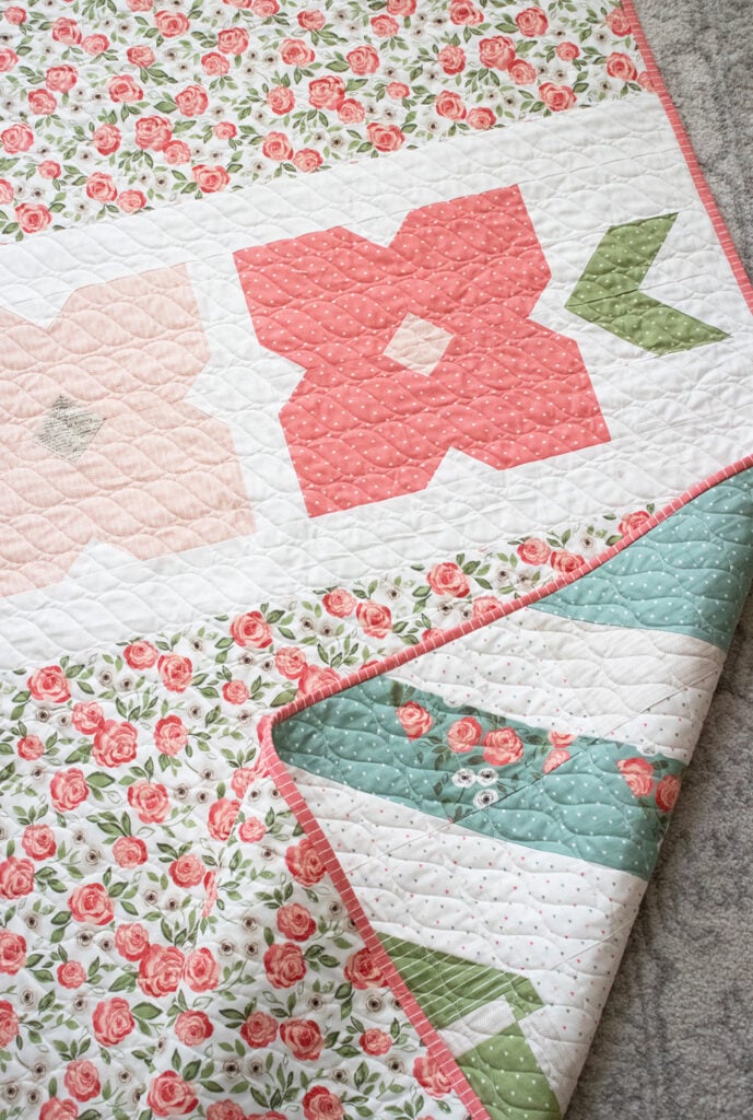 Rose in Bloom block of the month quilt by Vanessa Goertzen of Lella Boutique. Fabric is Love Note by Lella Boutique for Moda Fabrics.