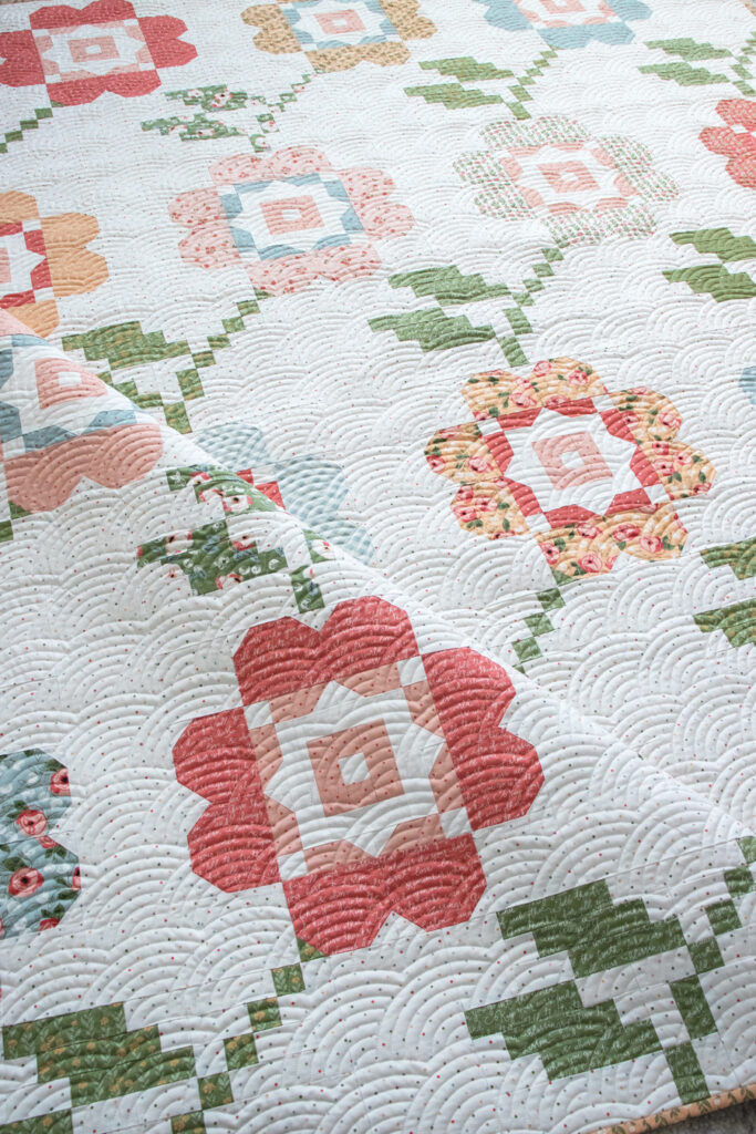 Bloomers flower quilt by Vanessa Goertzen of Lella Boutique. Make it with fat eighths. Fabric is Country Rose by Lella Boutique for Moda Fabrics.