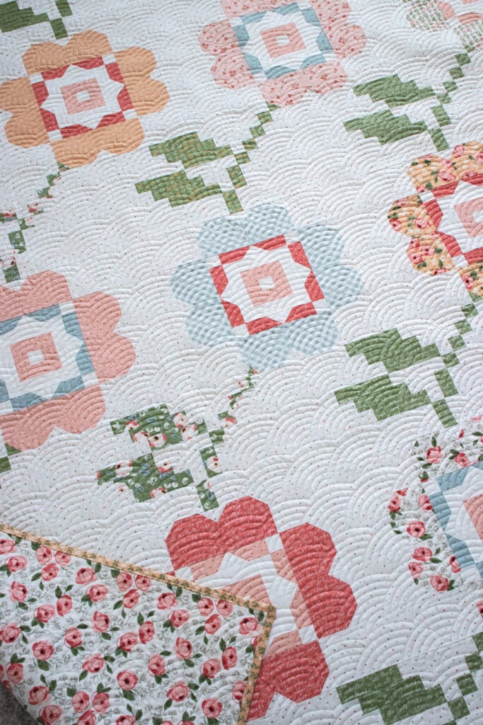 Bloomers flower quilt by Vanessa Goertzen of Lella Boutique. Make it with fat eighths. Fabric is Country Rose by Lella Boutique for Moda Fabrics.