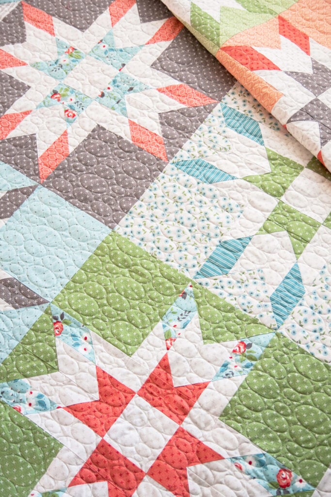 Mabel fat quarter quilt by Vanessa Goertzen of Lella Boutique. Fabric is Nest by Lella Boutique for Moda Fabrics. No y seams or paper piecing!