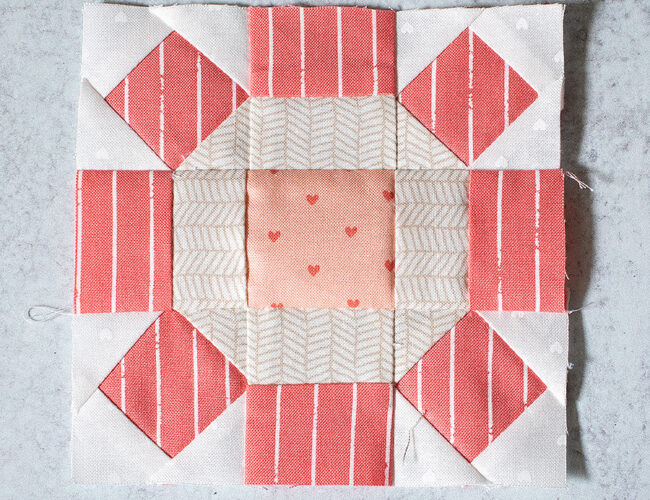 Moda Blockheads 4: free block of the week. Block 1 is "Square Wheel" by Lynne Hagmeier of Kansas Troubles. Fabric is Love Note by Lella Boutique for Moda Fabrics