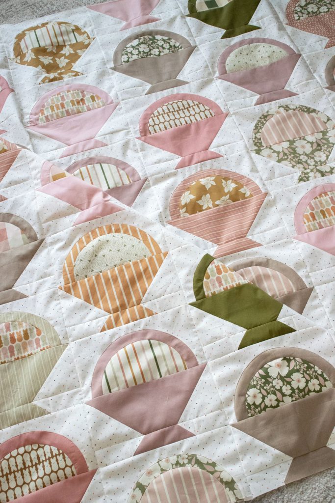 Gather basket quilt by Lella Boutique. Cute Easter basket quilt using Easter Party fabric by Indy Bloom Design. Layer Cake friendly!