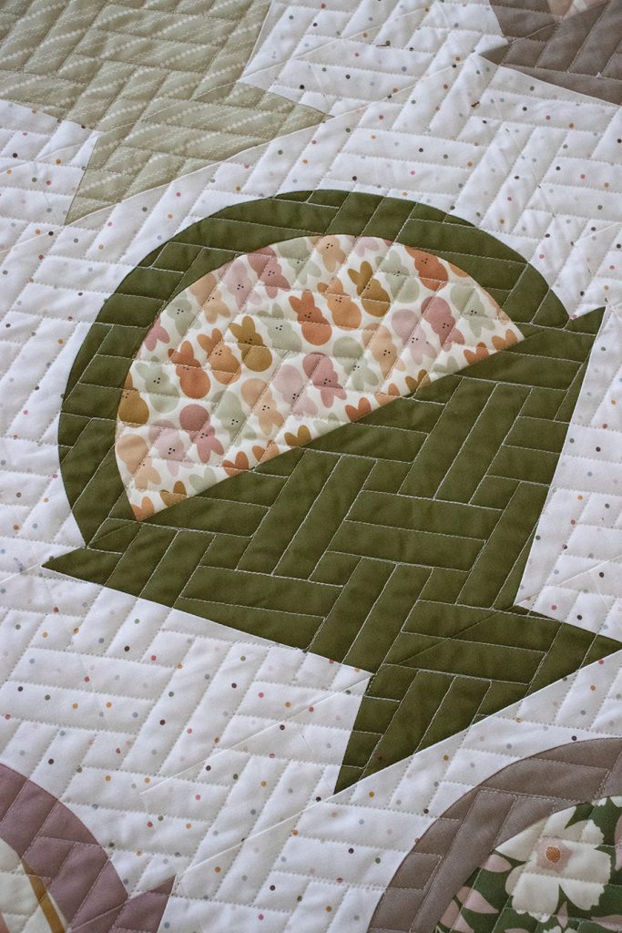 Gather basket quilt by Lella Boutique. Cute Easter basket quilt using Easter Party fabric by Indy Bloom Design. Layer Cake friendly!