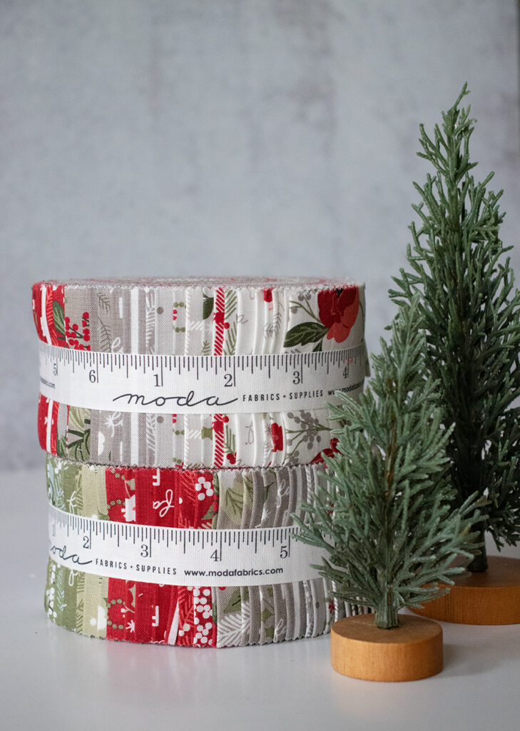 Jelly Rolls of Christmas Eve fabric by Lella Boutique for Moda Fabrics (arriving May 2023).