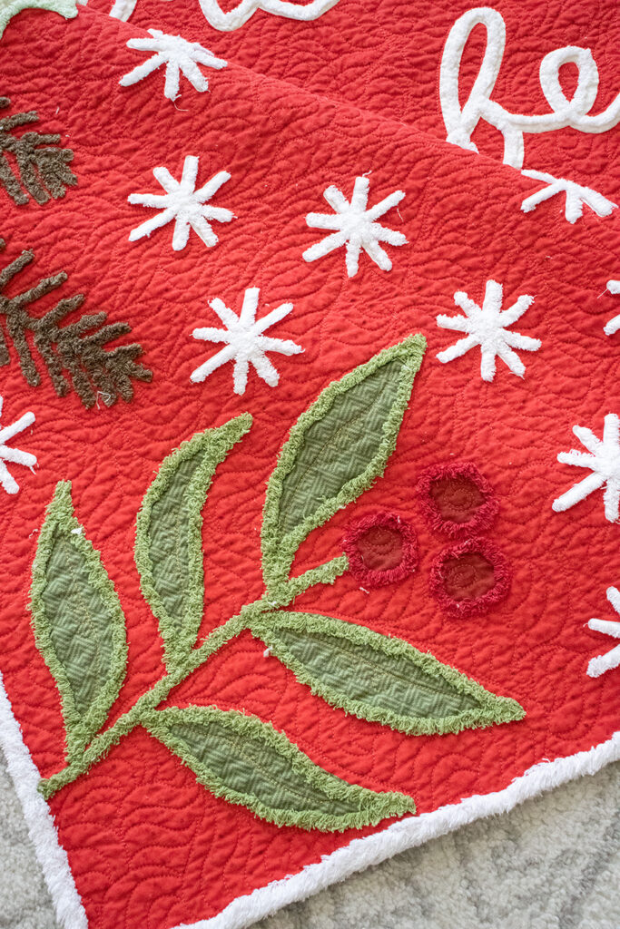 'Tis the Season quilt panel by Lella Boutique with Chenille-It details added. Join the sew along here!