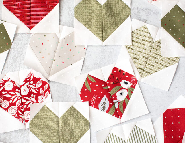 Heart blocks from the Lovey Dovey quilt pattern. Fabric is Christmas Morning by Lella Boutique for Moda Fabrics.