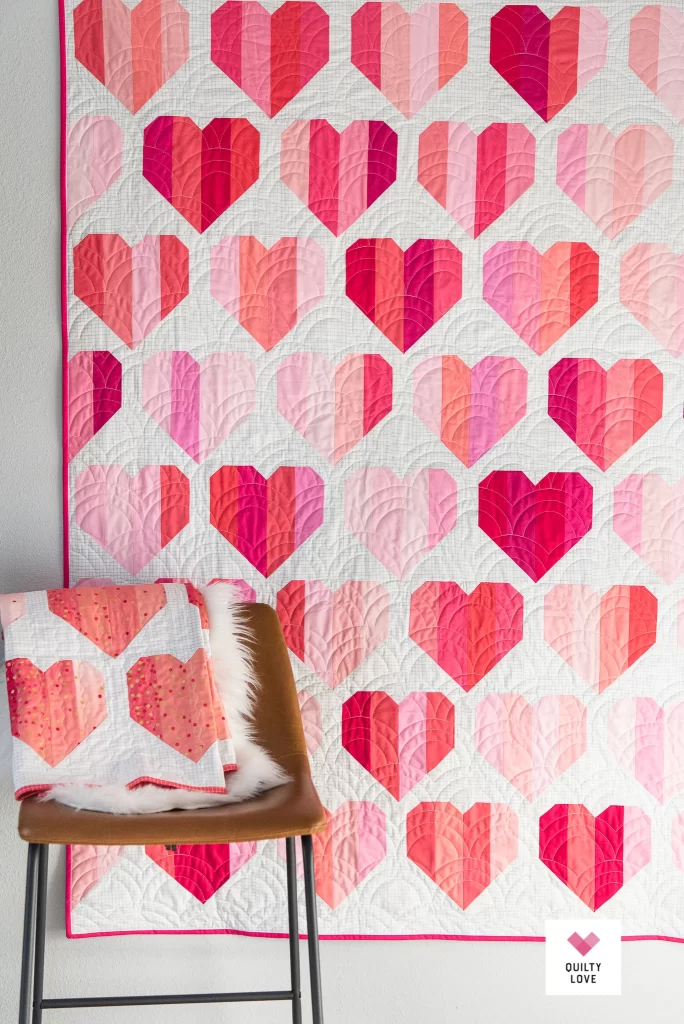 Infinite Hearts quilt pattern by Emily Dennis of Quilty Love. Download the pattern here!