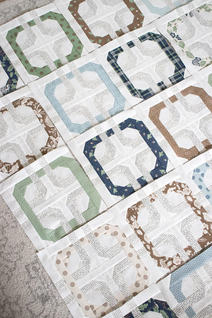 Concord quilt - a quilt with overlapping rings by Lella Boutique. Made with 1 Honeybun (1.5" strips) of Harvest Road fabric by Lella Boutique for Moda Fabrics.