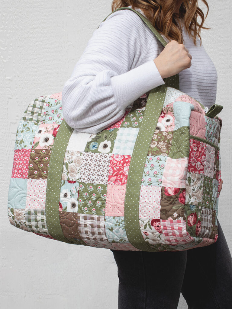 "Patchwork Duffle" bag pattern by Kaitlyn of Knot and Thread Design. Fabric is Lovestruck by Lella Boutique for Moda.
