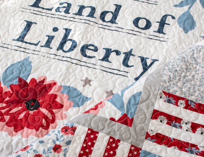 Sweet Land of Liberty quilt panel by Lella Boutique. With just 1 Layer Cake, add a scrappy patchwork border with Lella Boutique's "Sweet Land" pattern. Download the PDF here!