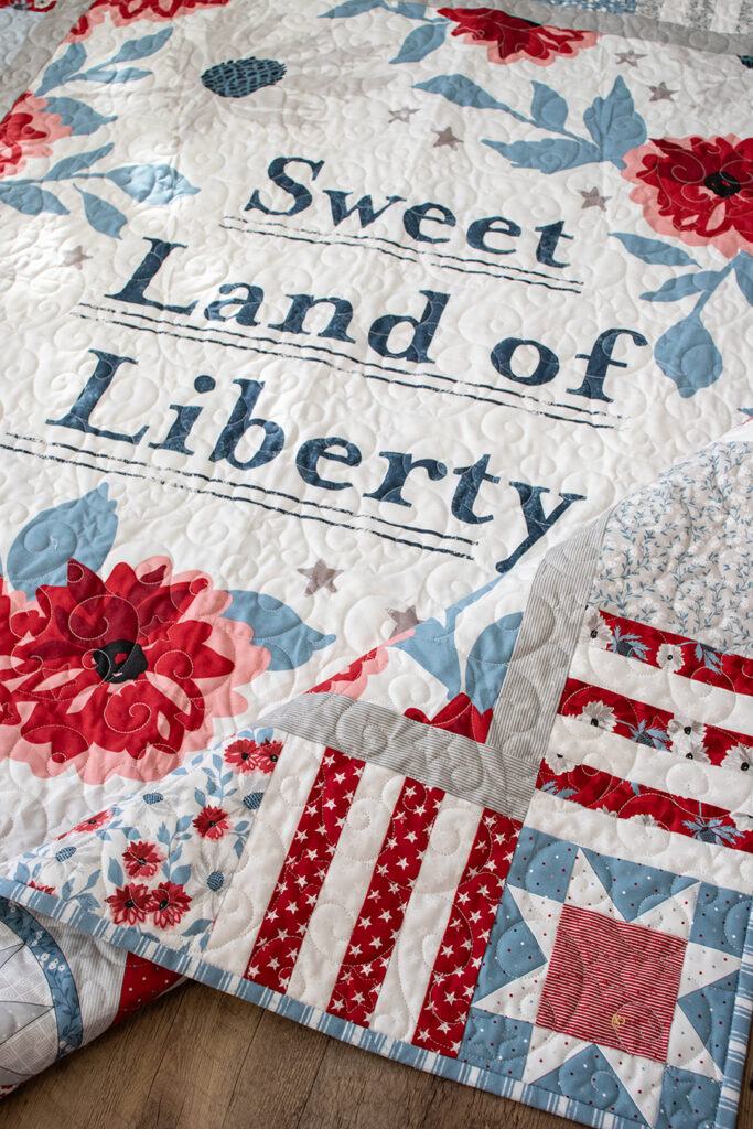 Sweet Land of Liberty quilt panel by Lella Boutique. With just 1 Layer Cake, add a scrappy patchwork border with Lella Boutique's "Sweet Land" pattern. Download the PDF here!