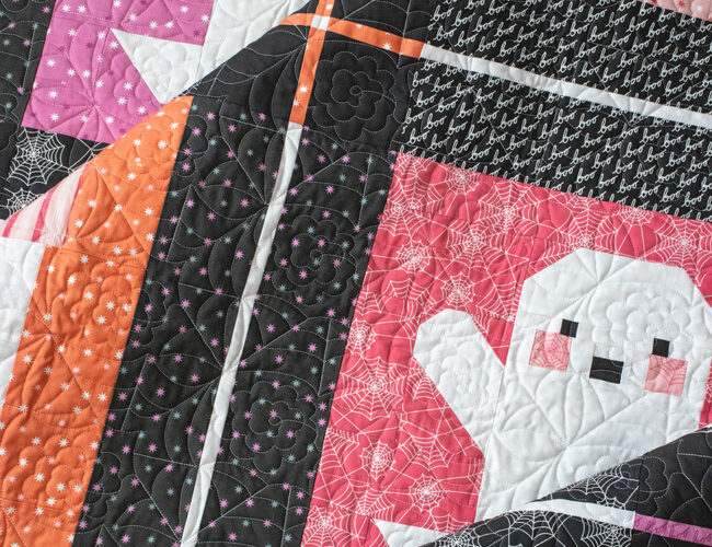 Ghost Town Halloween quilt by Vanessa Goertzen of Lella Boutique. Friendly ghost and haunted house quilt blocks in Hey Boo fabric by Lella Boutique for Moda Fabrics (arriving April 2024). Download the PDF here.