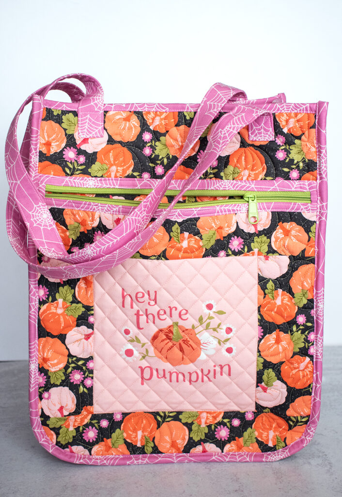 Cutest trick or treat bags in Hey Boo fabric by Lella Boutique for Moda Fabrics. Pattern is "Everyday Quilted Tote" by Kaitlyn at Knot and Thread Design.