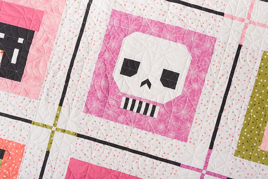 "The Skull" cute skeleton quiilt block is Block 2 for the Monster Mash quilt along using Hey Boo fabric.