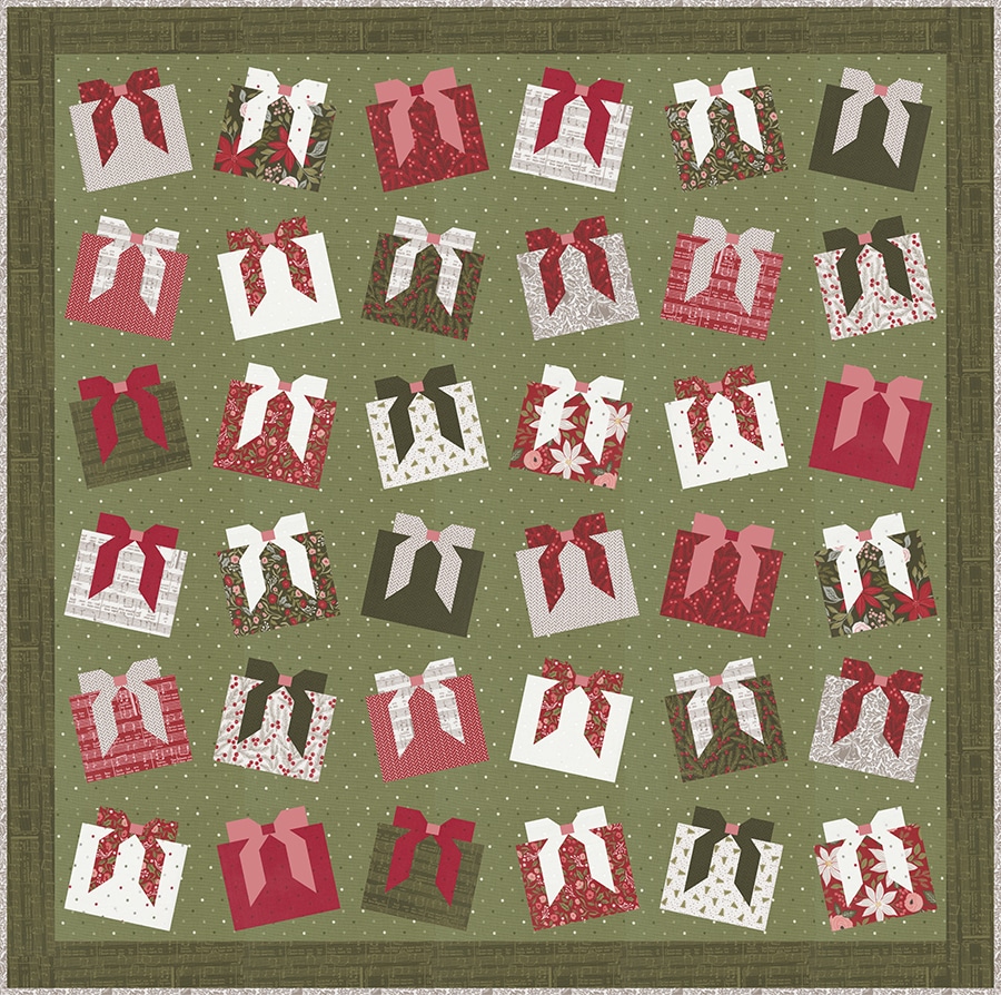 "Wrap it Up" wonky gift quilt in Berry & Pine fabric by Lella Boutique. Make it with fat quarters and fat eighths. The wonky Christmas present blocks get their offkilter look from a beginner partial-seam technique. Download the PDF here.