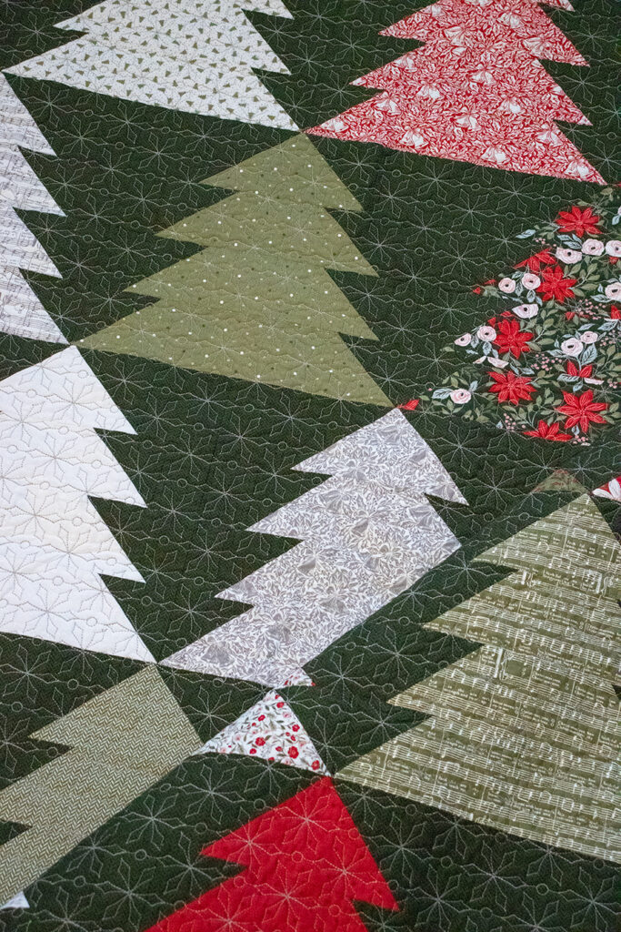 "Fir Tree Lane" geometric Christmas tree quilt. Make it with fat quarters or fat eighths. Fabric is Berry & Pine by Lella Boutique for Moda Fabrics. Download the PDF here!