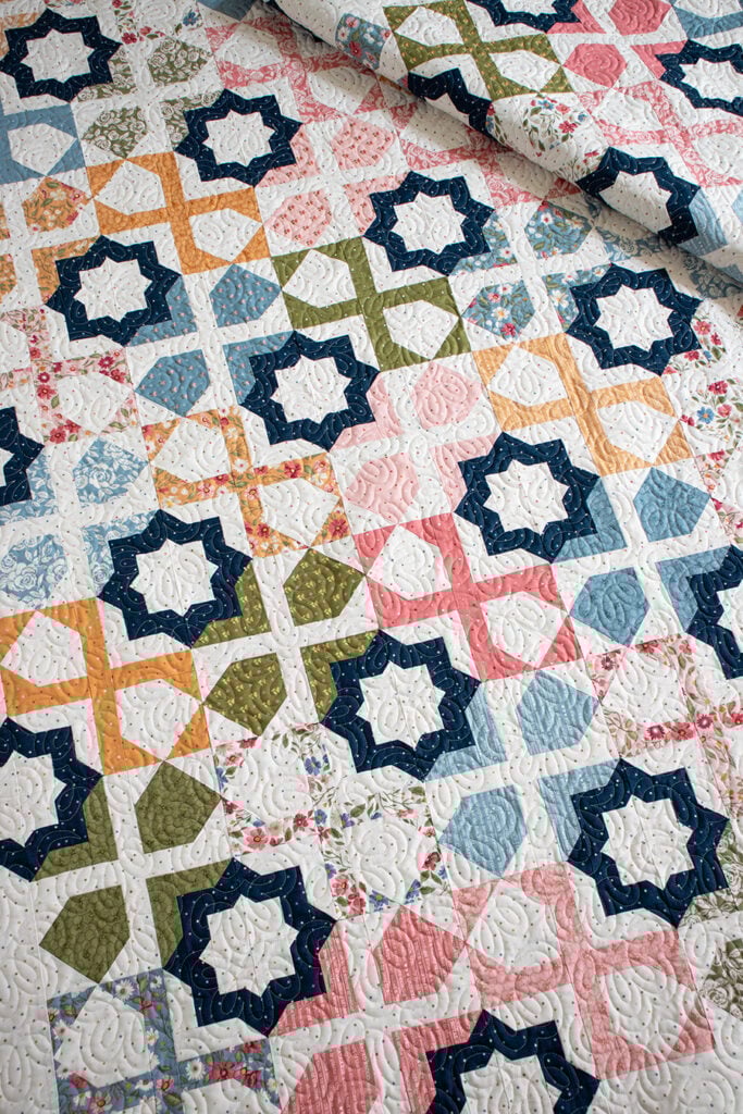 "Dreamer" star tile quilt is a stunner. Make it with a layer cake or fat eighths. Fabric is Wild Honey by Lella Boutique for Moda Fabrics. Download the PDF here.