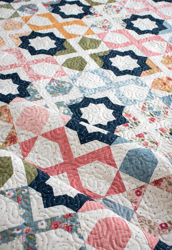 "Dreamer" star tile quilt is a stunner. Make it with a layer cake or fat eighths. Fabric is Wild Honey by Lella Boutique for Moda Fabrics. Download the PDF here.