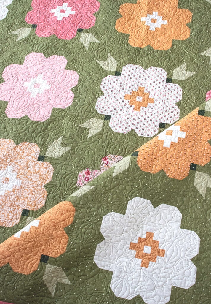 "Vintage Blooms" flower quilt by Lella Boutique. Fat quarter friendly. Fabric is Wild Honey by Lella Boutique for Moda Fabrics. Download the PDF here.