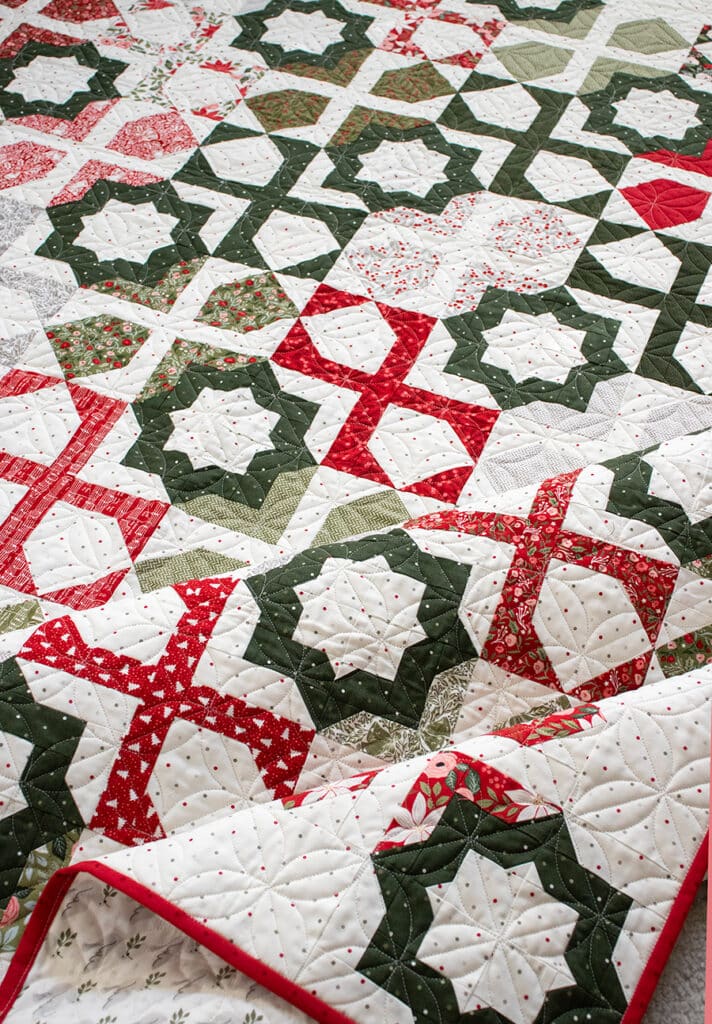 Dreamer star tile quilt in Berry & Pine fabric by Lella Boutique. Layer Cake or fat eighth friendly. Download the PDF here!