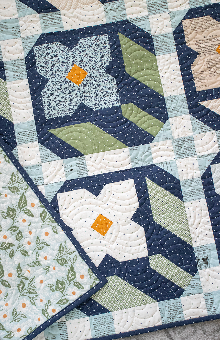 "Flower Press" geometric flower quilt by Vanessa Goertzen. Layer Cake friendly - fabric is True Love by Lella Boutique for Moda Fabrics. Download the PDF here!