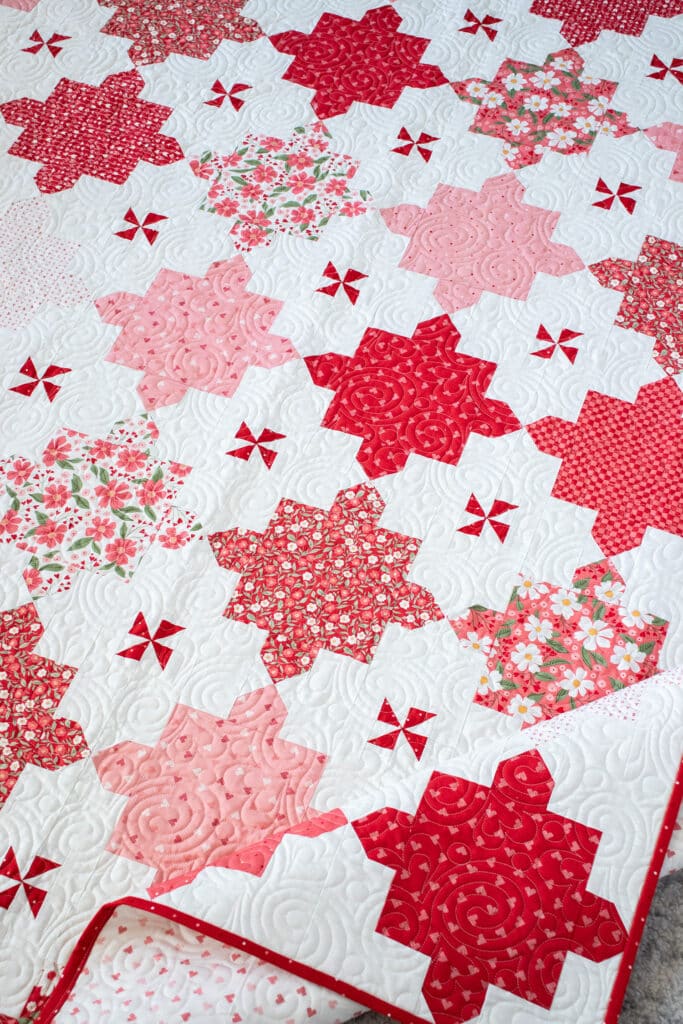 Sugar 'n Spice red geometric quilt in Love Blooms fabric by Lella Boutique for Moda Fabrics. Download the PDF here!