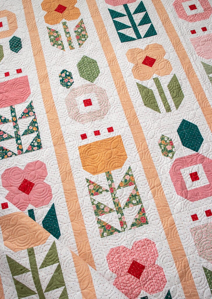 "Garden Party" flower quilt - a fat quarter quilt in Garden Glam fabric by Lella Boutique for Moda Fabrics. Download the PDF here!