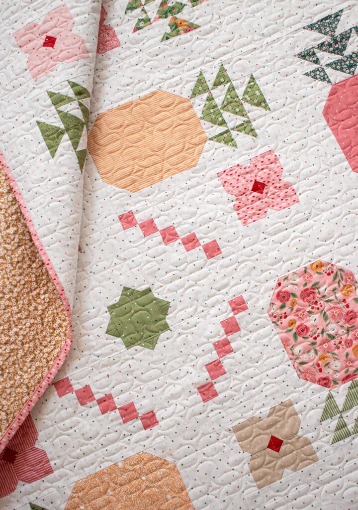 "Piña Colada" pineapple quilt in Garden Glam fabric by Lella Boutique. Download the PDF here.