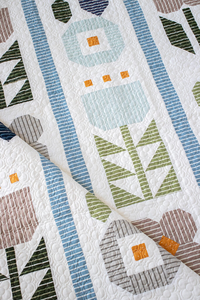 Garden Party quilt in Magic Stripe fabric by Lella Boutique for Moda Fabrics. Download the PDF here!