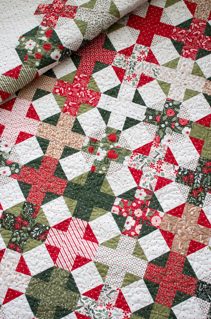 "Hot Cross Buns" plus sign quilt by Vanessa Goertzen of Lella Boutique. Make it with a Jelly Roll or Layer Cake. Fabric is Peppermint Cocoa by Lella Boutiqu for Moda Fabrics. Download the PDF here!