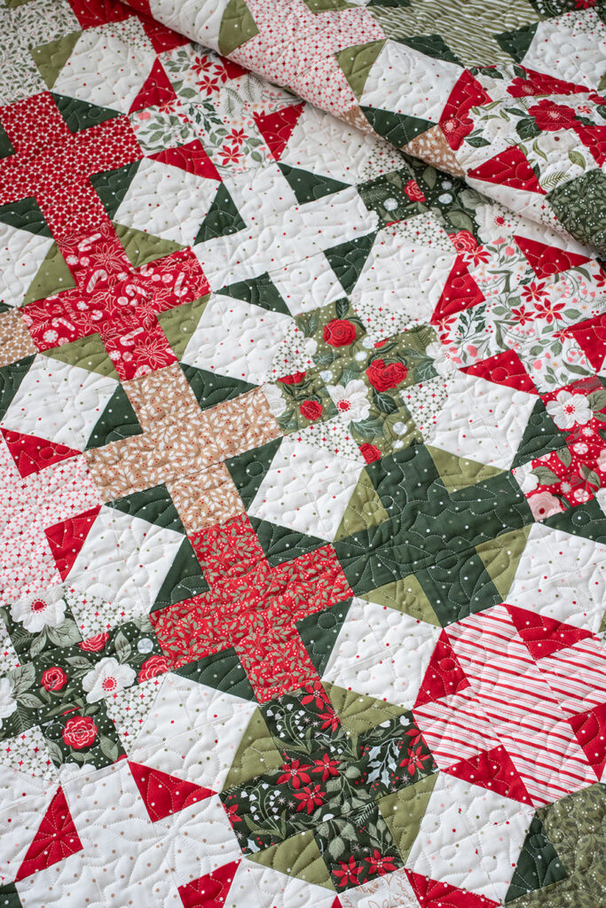 "Hot Cross Buns" plus sign quilt by Vanessa Goertzen of Lella Boutique. Make it with a Jelly Roll or Layer Cake. Fabric is Peppermint Cocoa by Lella Boutiqu for Moda Fabrics. Download the PDF here!